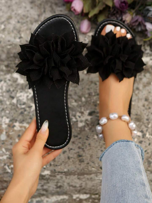 Sandalen mit einer Blume